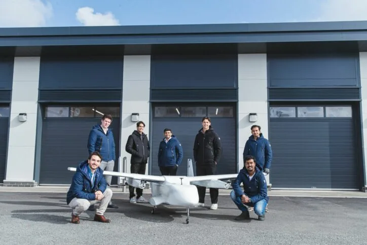 The Iona Drones team with a long-range delivery aircraft